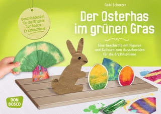 Der Osterhas im grünen Gras.