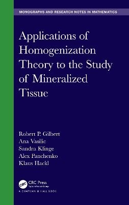 Applications of Homogenization Theory to the Study of Mineralized Tissue